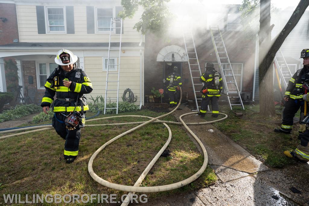 Deputy Chief Friddell relaying information over the radio at a fire in Rittenhouse Park.