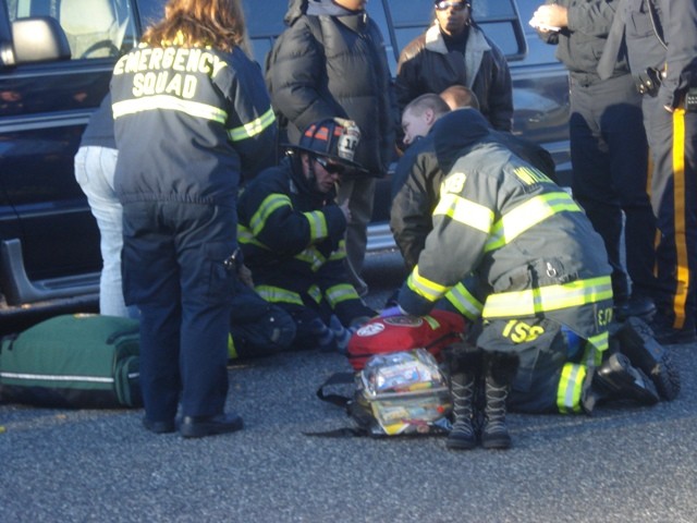 Captain Gardner assists in treating a young girl that got hit by a car