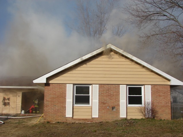 Heavy smoke coming from a house on Pensdale Lane 