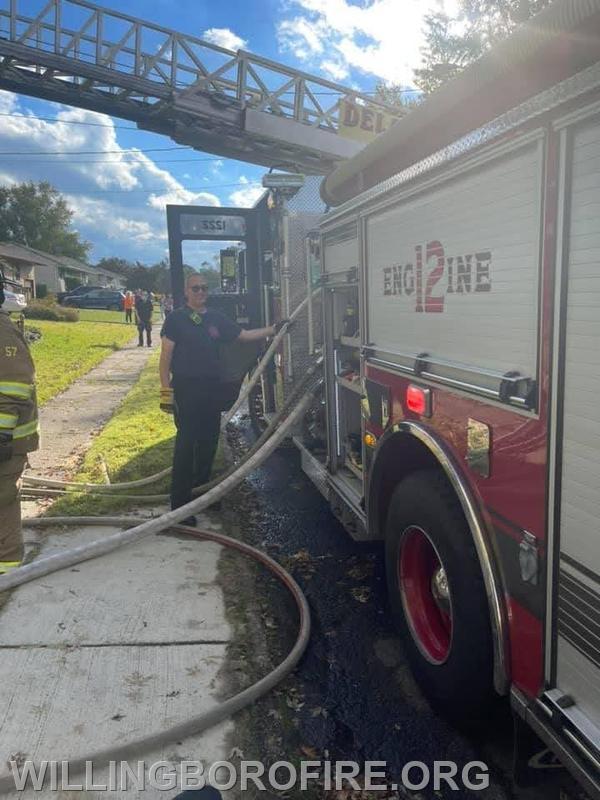 Firefighter Anderson pumping on an all hands fire in District 12.