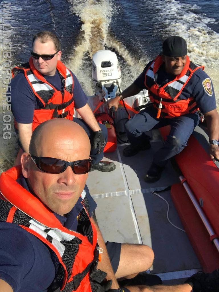 Firefighters Priest, Lehuquet, and Bowe training on Marine 16.