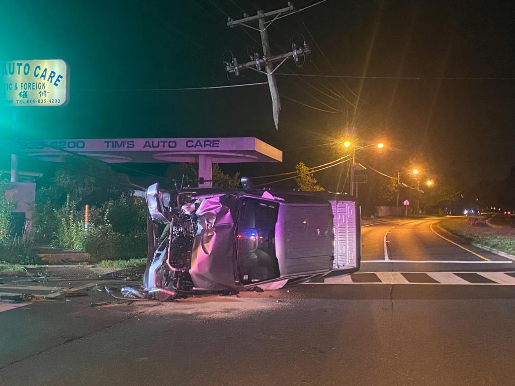 Fire and EMS crews on scene of an overturned pick up truck that took out a telephone pole.