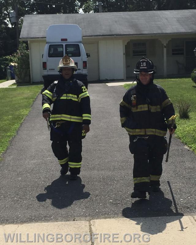 Chief Burnett and firefighter Carcasio on a fire call.