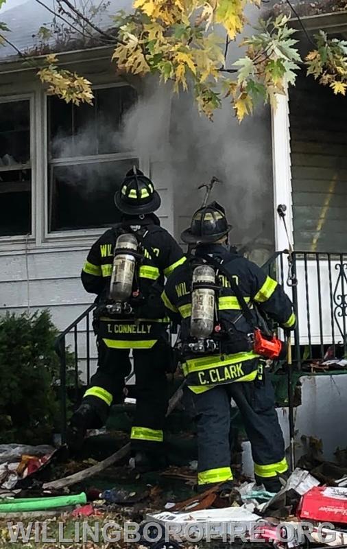 Firefighters Connelly and Clark at a fire in Edgewater Park.