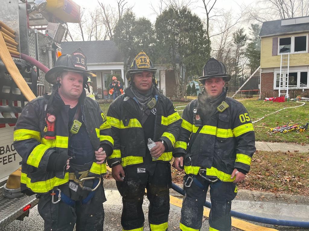 Firefighters Nardi, Child, and Centrone after an all-hands fire in Garfield Park.