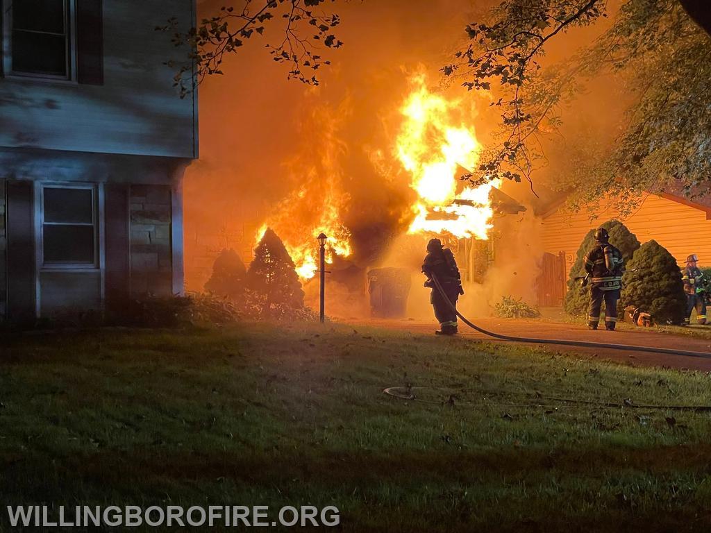 Firefighters Lehuquet and Clark preparing to make entry on an all hands fire in Twin Hills.