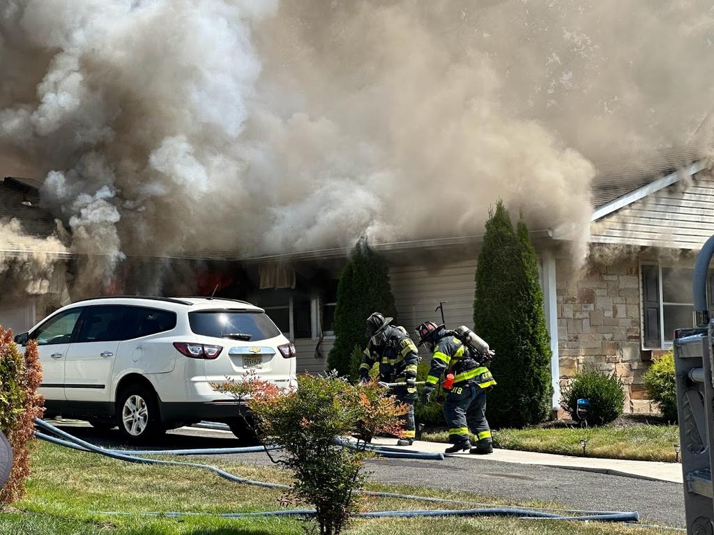 Firefighter Centrone and Lt O'Donnell making entry.