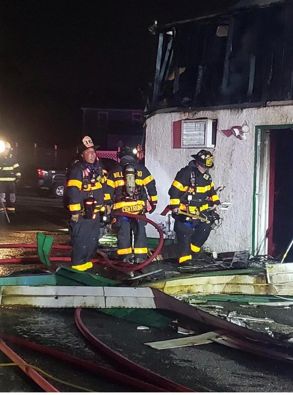 Captain Fresco with firefighters Centrone and Nardi at an all hands building fire in Delran.