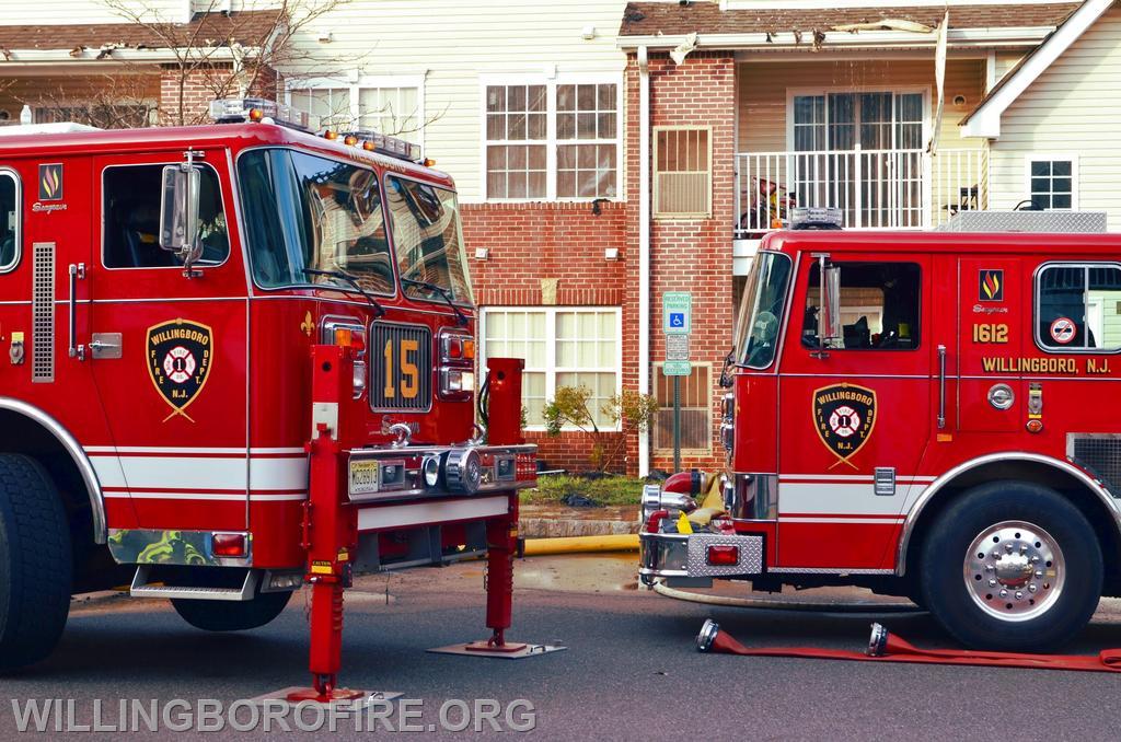 Ladder 1615 and engine 1612 operating at a multiple alarm fire on Millennium Drive.