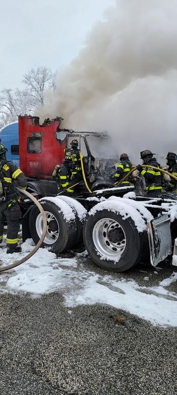 Firefighters assisting Burlington Twp on a tractor fire.