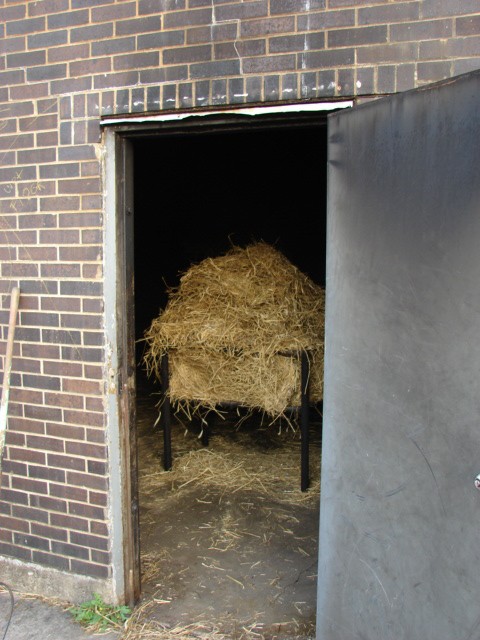 A rack of straw prepared for burn training