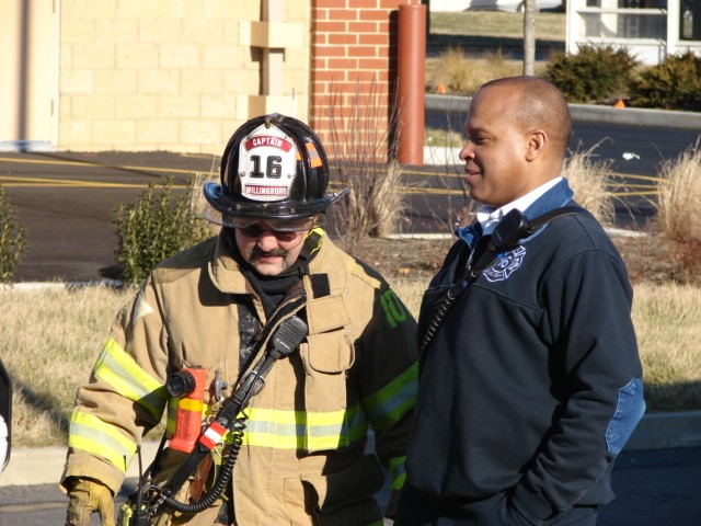 Captain Ramsey (l) and Chief Burnett (r) at an accident on Campbell Way