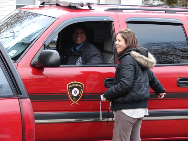 Chief Burnett (l) and Fire Official Vetter (r) after a house fire in Pennypacker Park