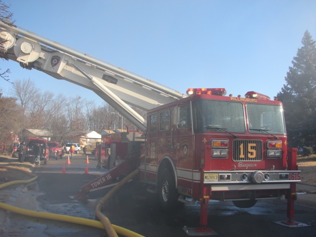 Ladder 1615 in service at a house fire on Eastern Lane