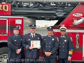 FF Michael Nardi, Lt. Erin O'Donnell, FF Michael Centrone, and Chief Anthony Burnett (Pictured L to R)